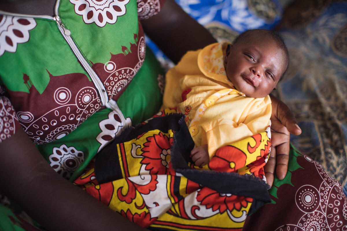 Emily, 29, lives with her husband and four children in Bungoma, Kenya. All of their children were born at Kabula Health Centre, which is supported by Save the Children.

Emily gave birth to baby Blessing at the health facility. She wasn’t able to deliver the placenta at first and is thankful that the nurses were there to help her to do so. Emily advises that other pregnant women visit a health facility rather than risk giving birth at home.

Emily chose the name Blessing because she feels her new baby is a gift and will be a huge blessing in her life. Emily tells us she has had enough children, and wants to focus on looking after them and working on her business.